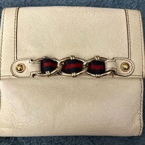 Authentic Gucci Wallet. Snaps and leather in good condition
